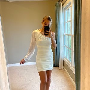 One shoulder slit sleeve white dress